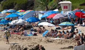 Beachfront Vacation Spot Imposes Fines on Sun Shades and Canopies