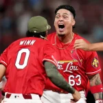 Cardinals fans in an empty section create electric scene during walk-off win over Royals