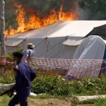 Ebola Treatment Center Torched in Congo Amidst Body Dispute