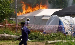 Ebola Treatment Center Torched in Congo Amidst Body Dispute