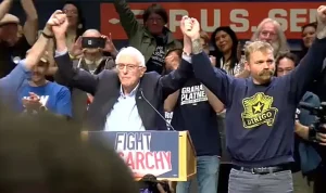 Graham Platner, Maine Senate Candidate, Embraces Democratic Socialism at Sanders Rally