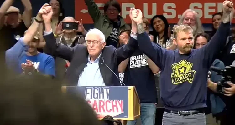 Graham Platner, Maine Senate Candidate, Embraces Democratic Socialism at Sanders Rally