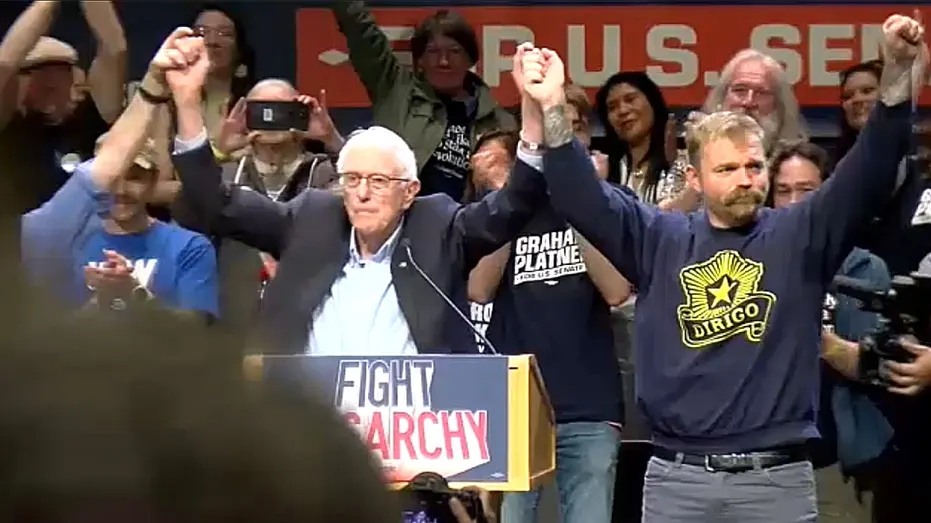 Graham Platner, Maine Senate Candidate, Embraces Democratic Socialism at Sanders Rally
