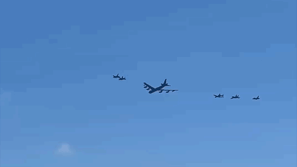 Historic bomber-fighter formation flies over Miami Beach