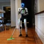 Humanoid Robot Cleans First American Apartment