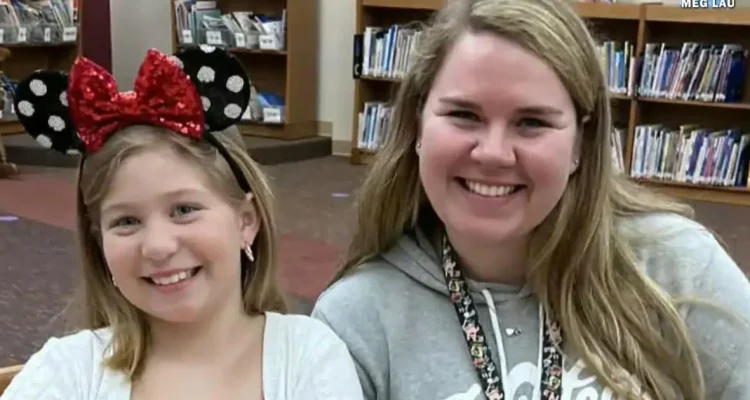 Michigan Teacher Steps In During Talent Show Hiccup