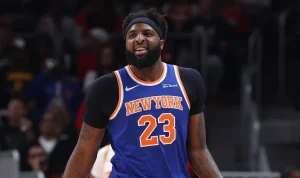 mitchell-robinsons-broken-pinky-threatens-knicks-finals-rotation-ahead-of-game-1-31083 Mitchell Robinson's Broken Pinky Threatens Knicks' Finals Rotation Ahead of Game 1