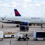 Passenger Yells "I Want Off," Calls Crew "Idiots," and Opens Emergency Exit