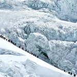 Record Climbers Reach Everest Summit from Nepal Amidst Overcrowding Worries