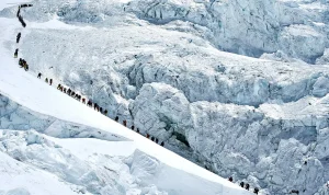 Record Climbers Reach Everest Summit from Nepal Amidst Overcrowding Worries