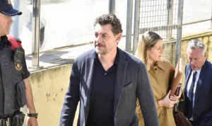 Son of Mango Founder Denies Killing Him