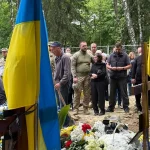 The Ukrainian City's Defiance: Funerals, Beauty Queens, and Bombs