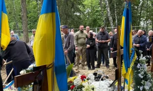 The Ukrainian City's Defiance: Funerals, Beauty Queens, and Bombs