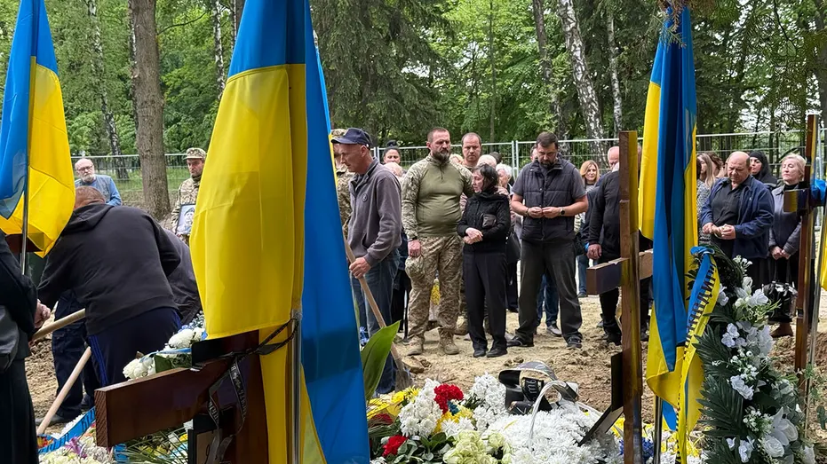 The Ukrainian City's Defiance: Funerals, Beauty Queens, and Bombs