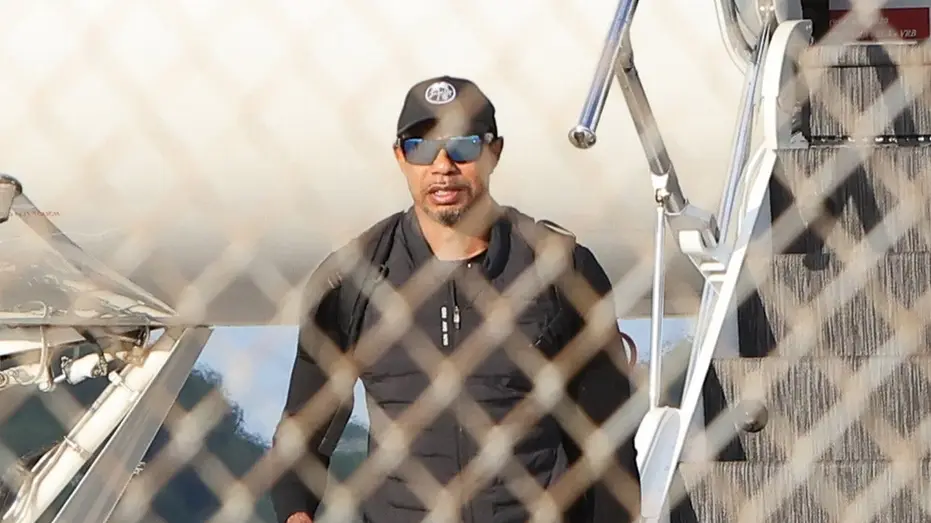 Tiger Woods Seen Disembarking Private Jet After Swiss Treatment Following DUI Arrest