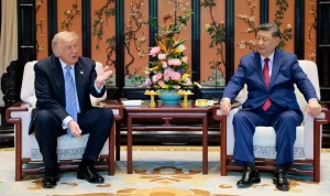 Trump praises "fantastic trade deals" before meeting with Xi amid tariff dispute