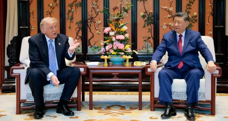 Trump praises "fantastic trade deals" before meeting with Xi amid tariff dispute