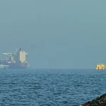Two U.S. Navy destroyers pass through Strait of Hormuz following Iranian threat