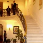 What led to a wealthy widow's death at the foot of her mansion's stairs?