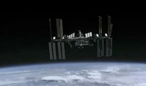 Crew evacuates to safe haven during space station leak repair