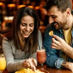 Drinking alcohol may influence cravings for certain foods in a surprising way, study suggests