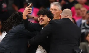 Fan interrupts NBA Finals Game 1 for a selfie with Victor Wembanyama