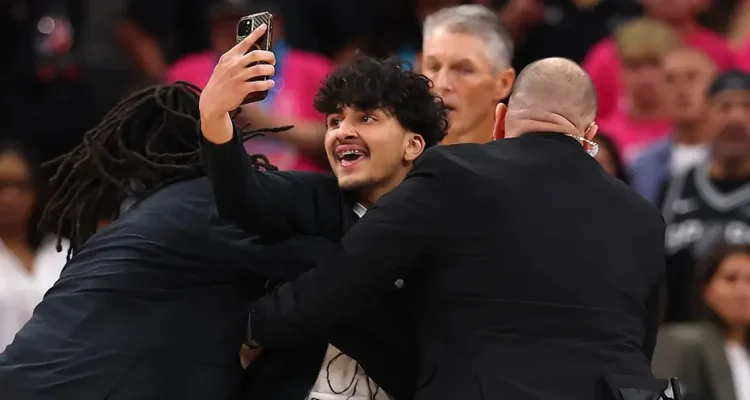 Fan interrupts NBA Finals Game 1 for a selfie with Victor Wembanyama