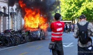 g7-protest-turns-violent-demonstrators-torch-tesla-smash-un-office-32579 G7 Protest Turns Violent, Demonstrators Torch Tesla, Smash UN Office