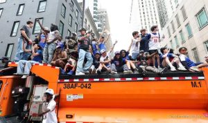 knicks-fans-scale-vehicles-many-locked-out-of-packed-parade-52281 Knicks Fans Scale Vehicles, Many Locked Out of Packed Parade