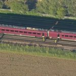 Two-train collision injures passengers amid chaotic emergency response